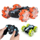 Stunt RC Car with 360 degree LED light-up wheels in orange and green